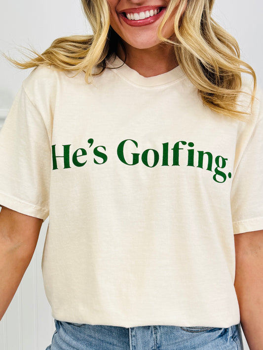 He's Golfing Graphic Tee