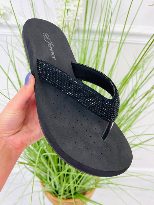 Radiance Rise Flip Flops In Black