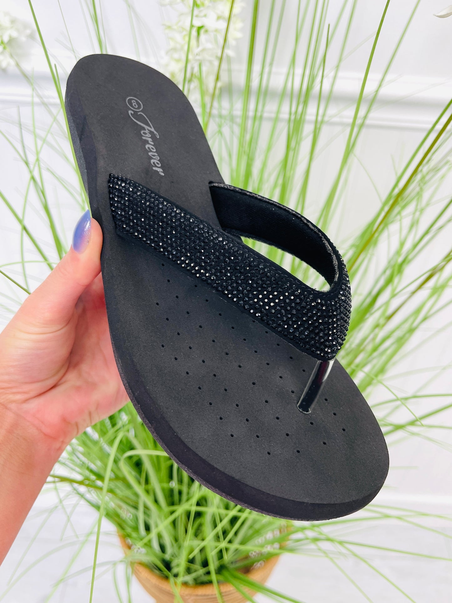 Radiance Rise Flip Flops In Black