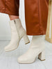 Stomp To The Rhythm Booties In Ivory