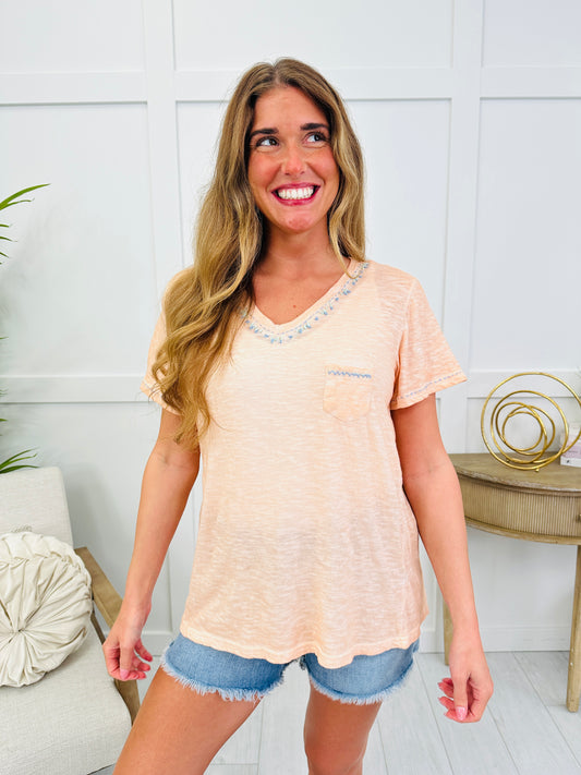 The Finishing Touch Top In Coral Peach