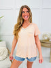 The Finishing Touch Top In Coral Peach